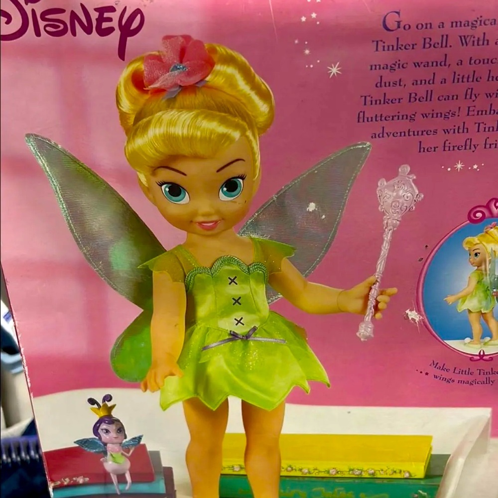 Disney Tinker Bell Doll 2005 playmates preowned. Box is damaged but doll is new.